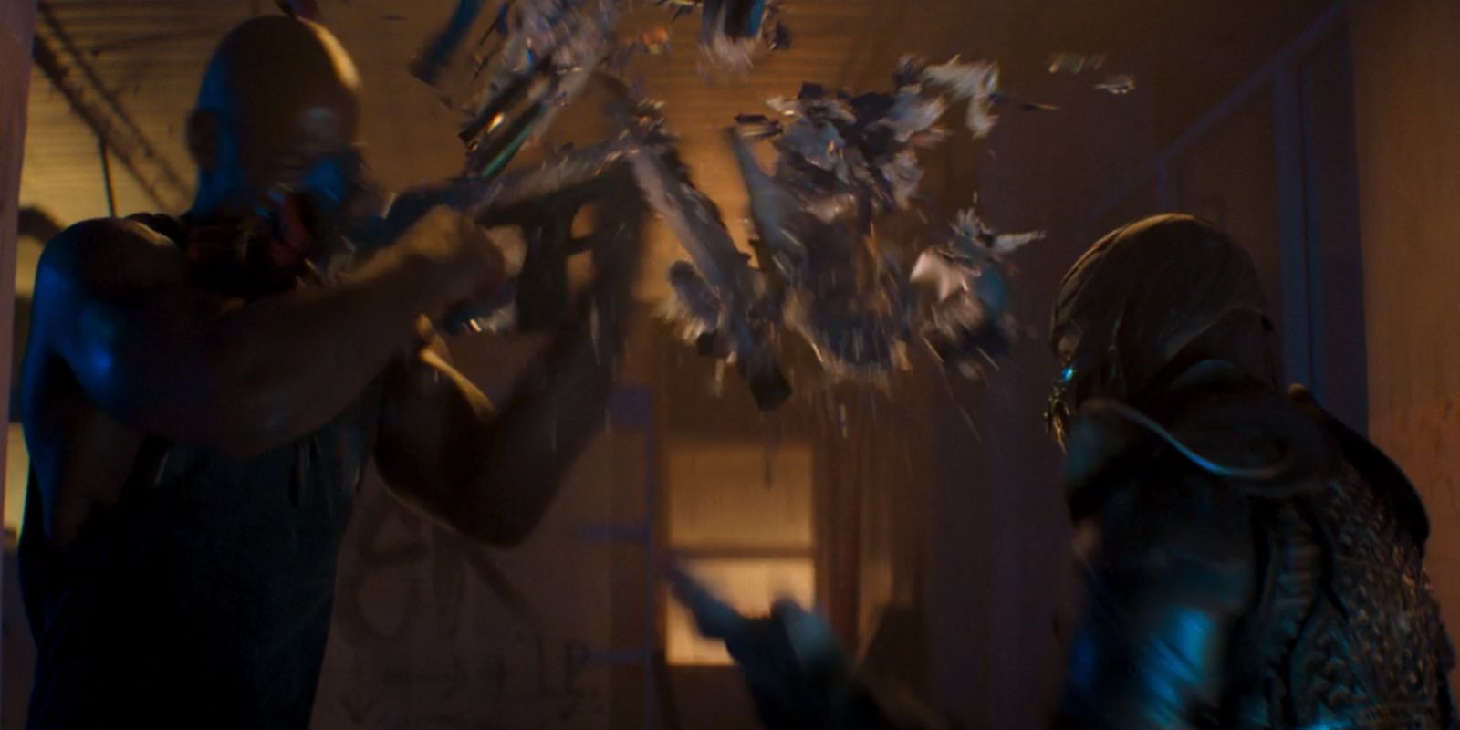 Sub-Zero shattering Jax's combat shotgun in Mortal Kombat 2021
