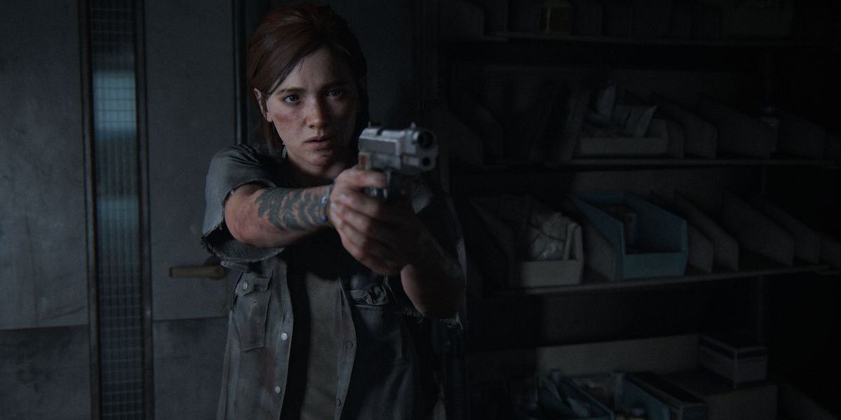 Ellie aiming her pistol in The Last of Us Part II
