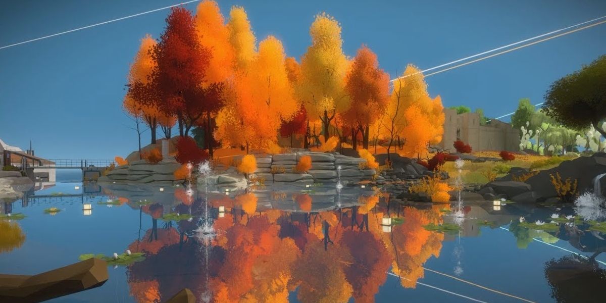 Autumn trees over water.