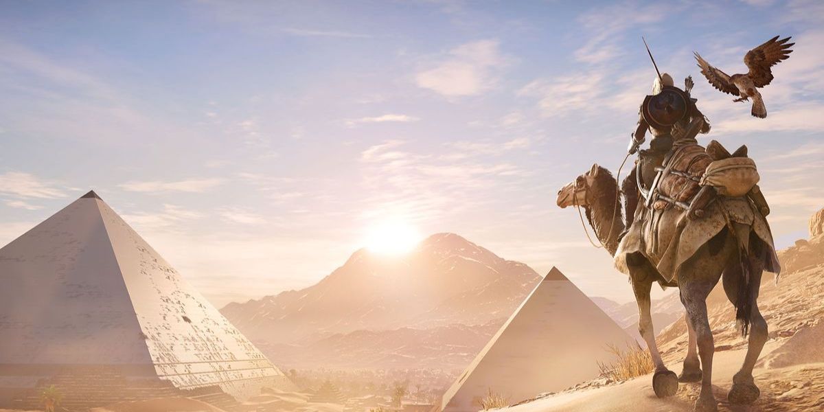 Assassin's Creed Origins Screenshot Of Bayek Riding Camel Staring At Pyramids