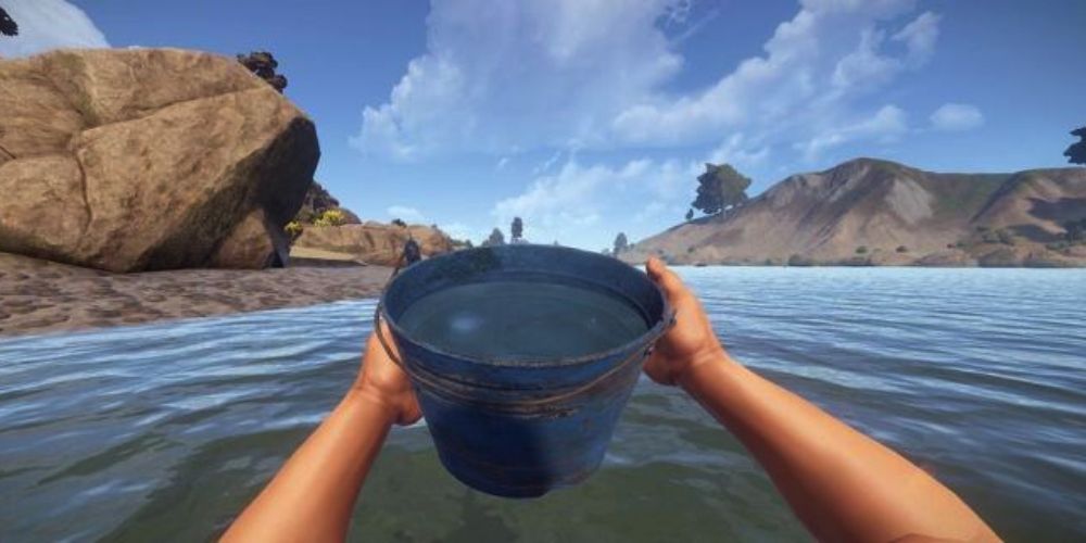 A player holding a water bucket.
