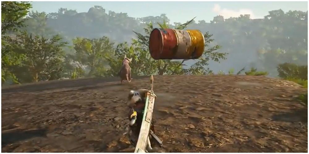 Player using the Telekinesis Mutation in Biomutant to lift a barrel in the air to throw at an enemy