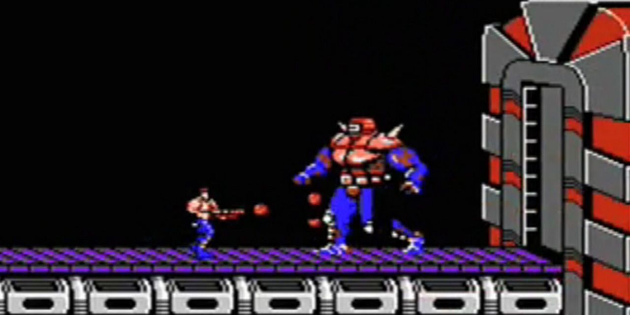 Fighting one of the mid-game bosses in the nes Contra.