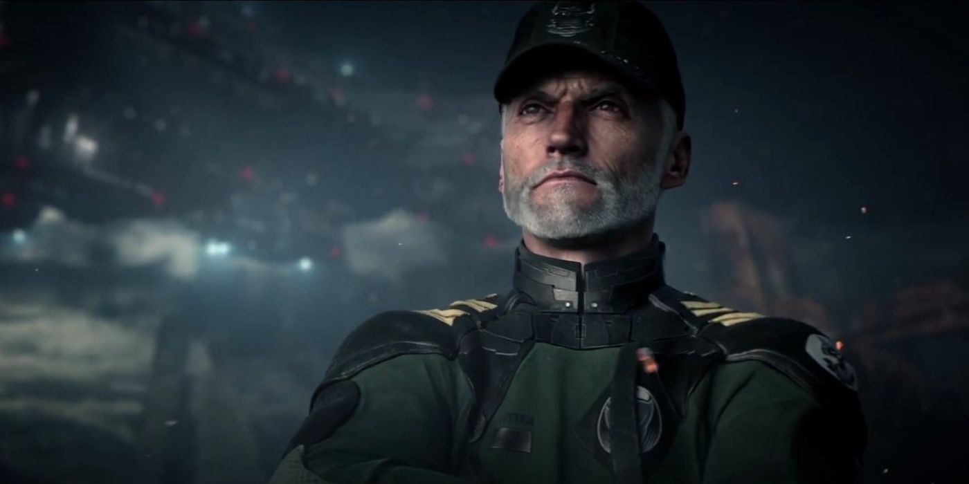 Captain Cutter stands diligently in his uniform in a Halo Wars 2 cutscene