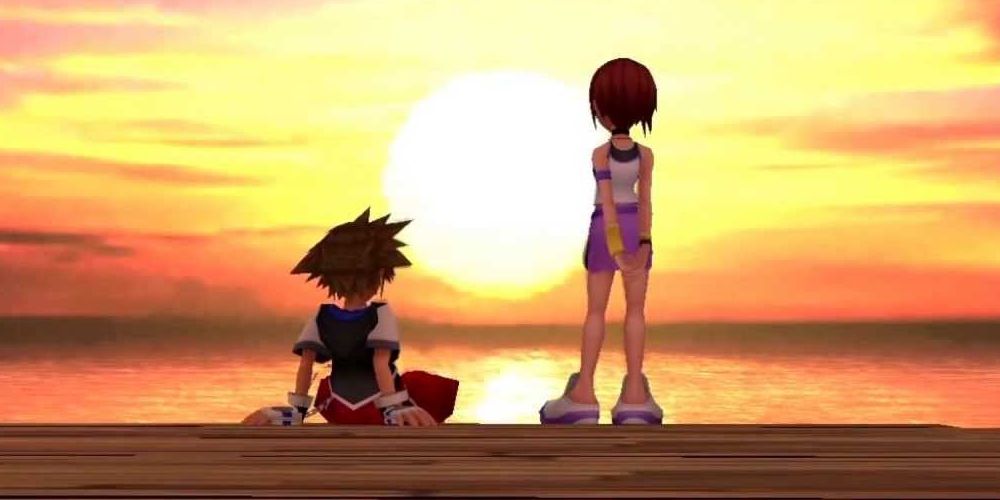 Sora and Kairi watch the sunset in Kingdom Hearts 1