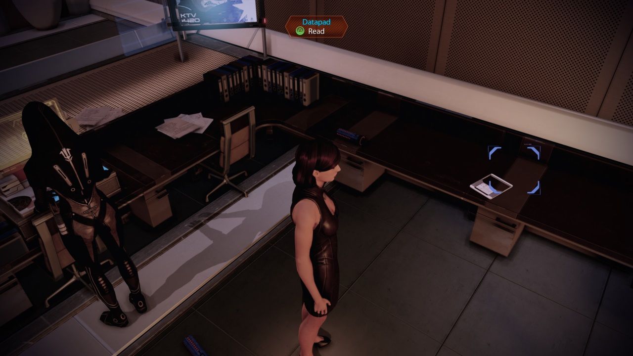 Mass Effect 2, Shepard collecting the Datapad in the Security Room