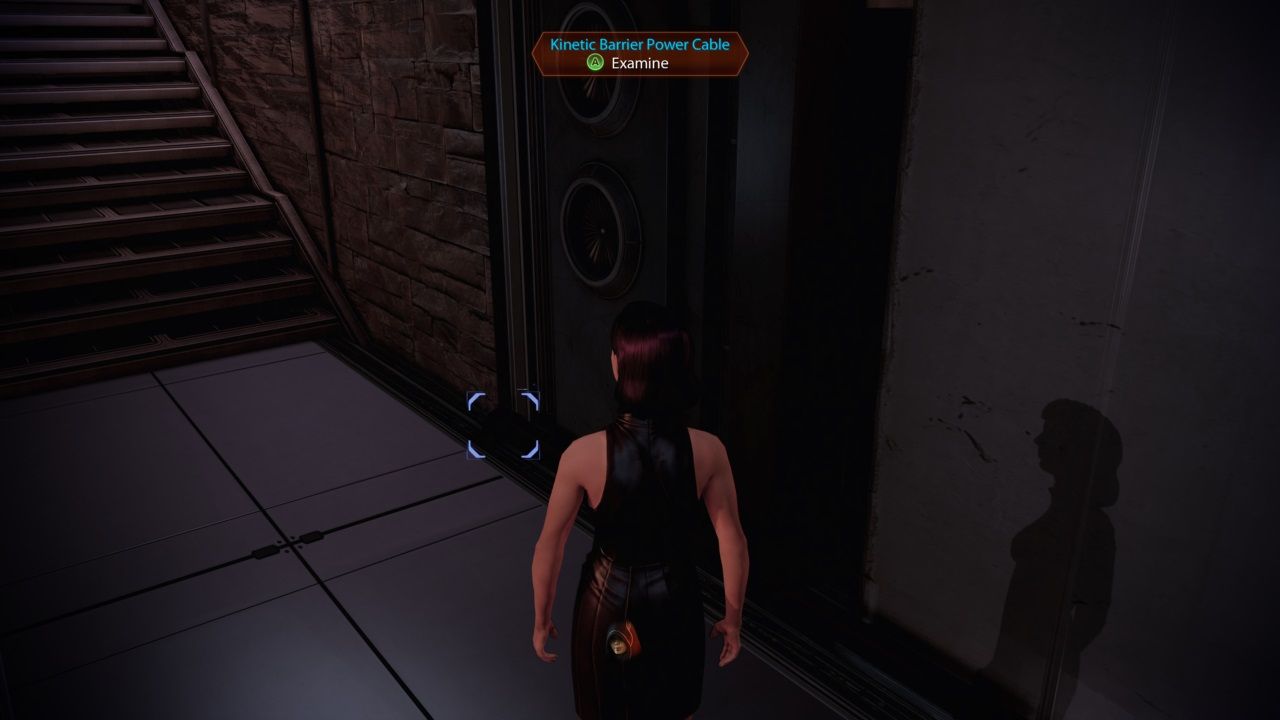Mass Effect 2, Shepard examining the Kinetic Barrier Power Cable outside of the vault