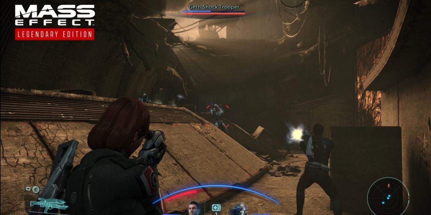 Mass Effect Legendary Edition Gameplay Screenshot Female Shepard In Combat With Geth Shock Trooper