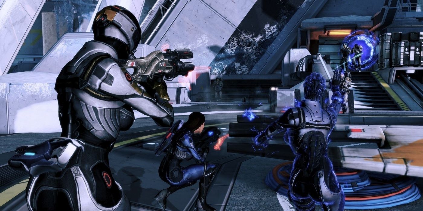 Mass Effect Legendary Edition Gameplay Screenshot Female Shepard In Combat With Miranda And Liara