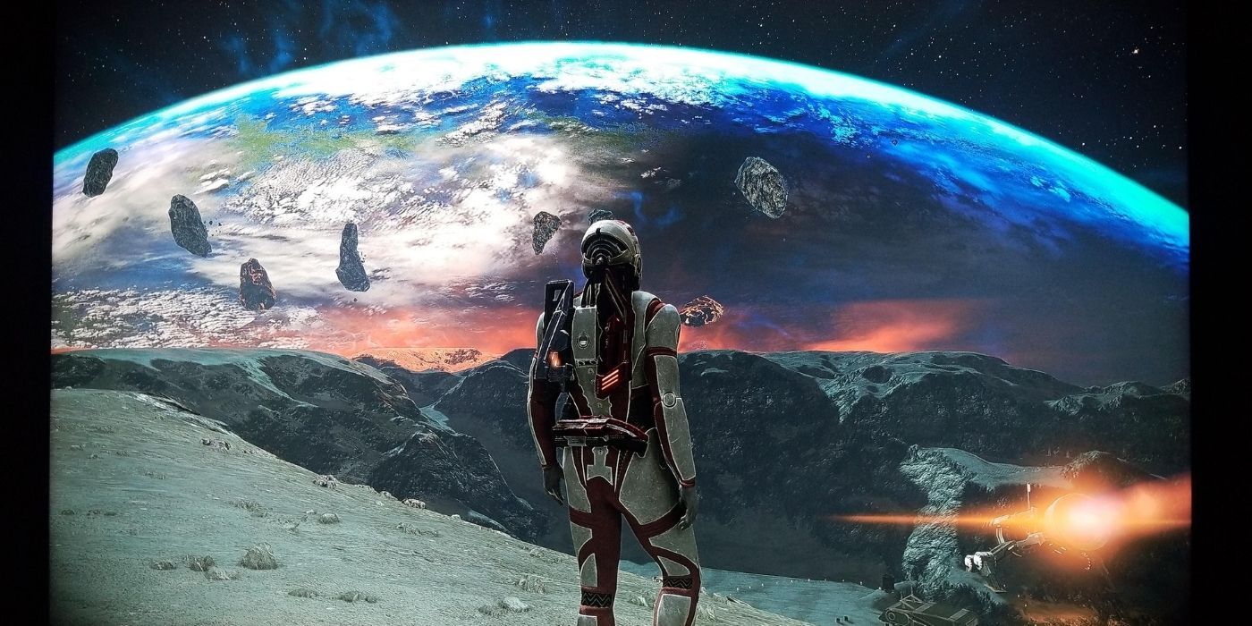 Mass Effect Legendary Edition Gameplay Screenshot Of Player Looking At Earth From The Moon