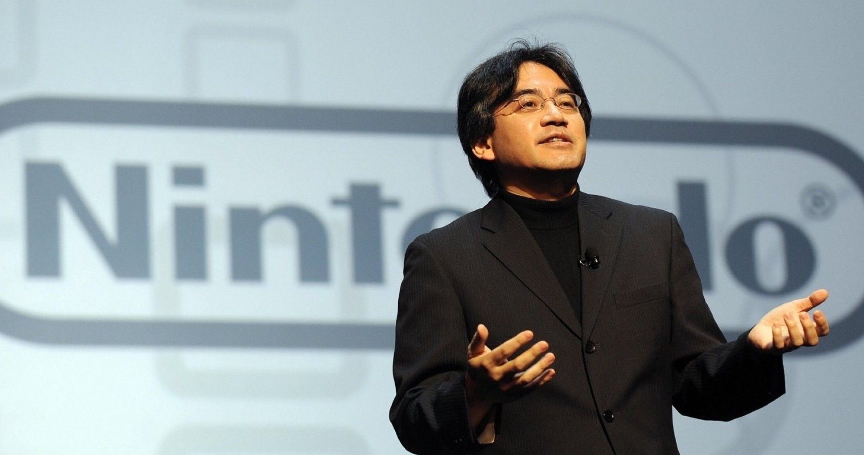 Satoru Iwata, CEO of Nintendo speaking at a