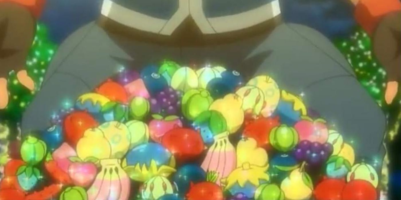 Pokemon Berries - Image from the anime of character standing over a pile of berries