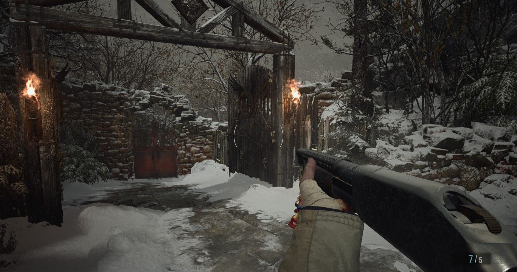 Ethan using a shotgun while having it equipped with a charm.