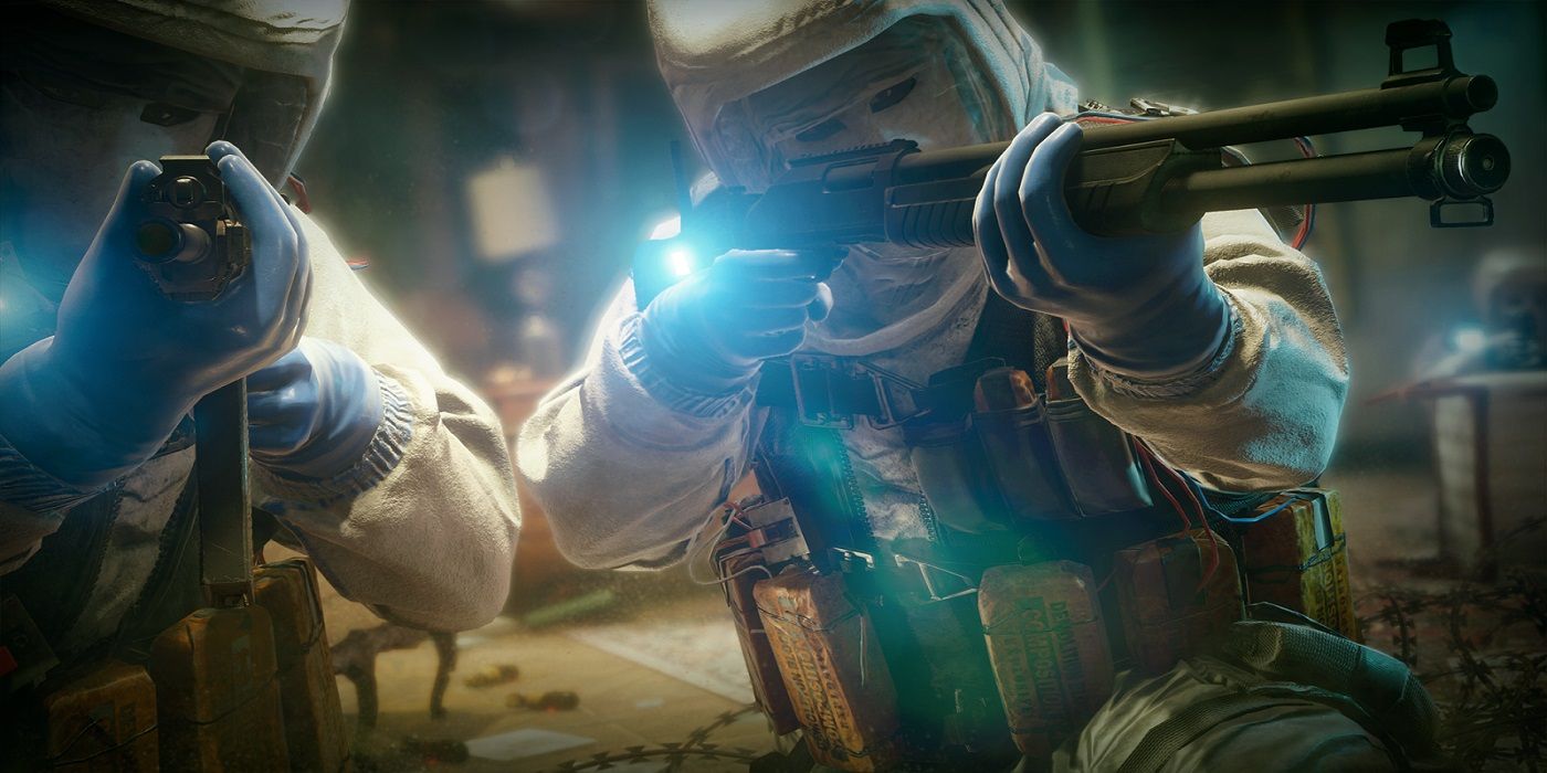 Tom Clancy's Rainbow Six Siege promotional image two combatants weapons raised