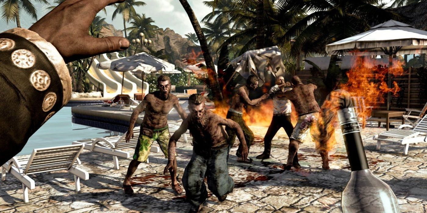 Encroaching zombies approach the player who is ready to chuck a molotov right at them in Dead Island
