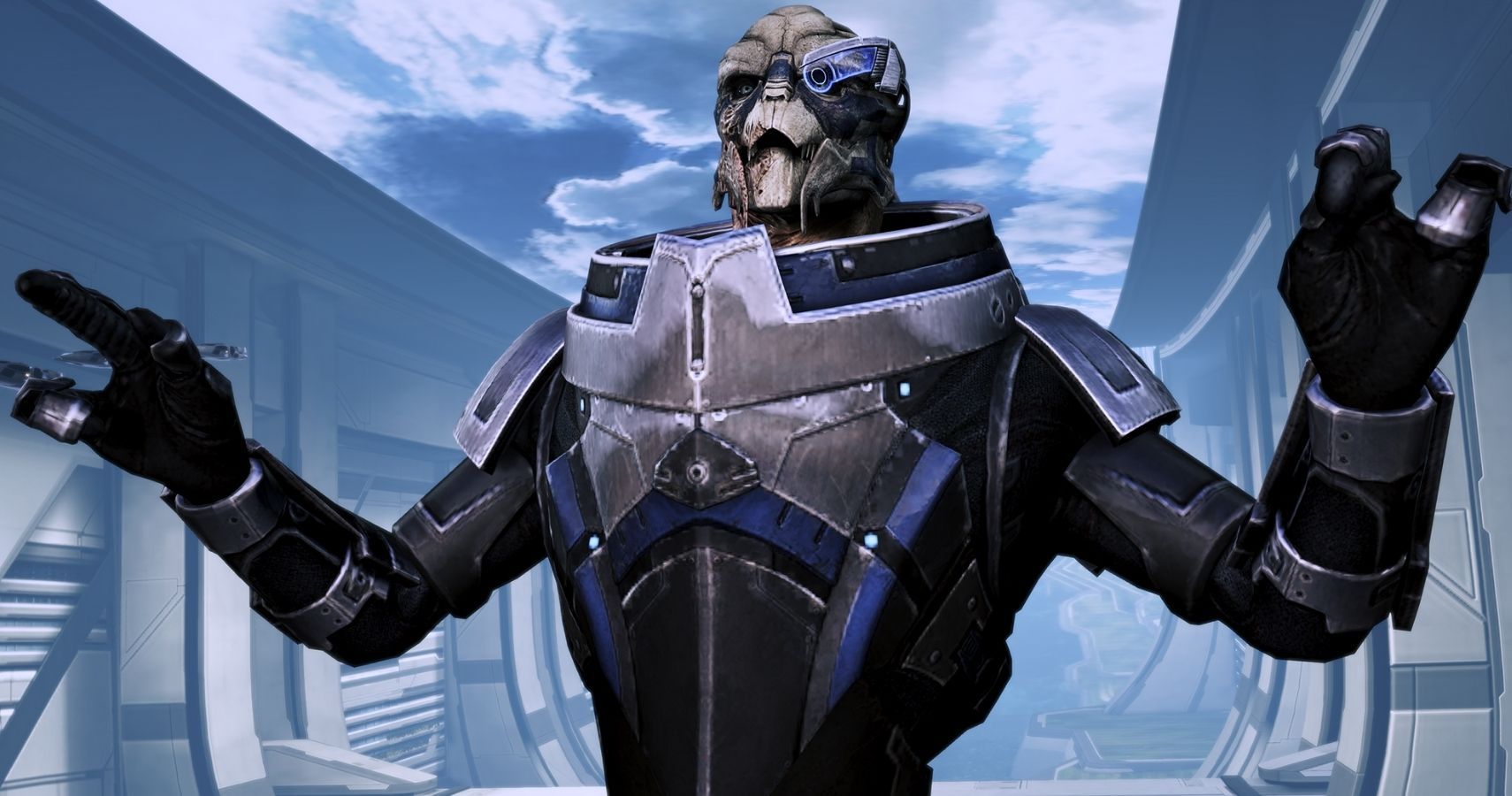 Garrus, a tall alien from the Mass Effect series, stands in a city setting. His arms are in the air with joy.