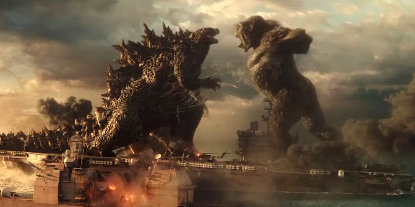 kong swings a wild right hook at godzilla as the two fight on the deck of a military ship
