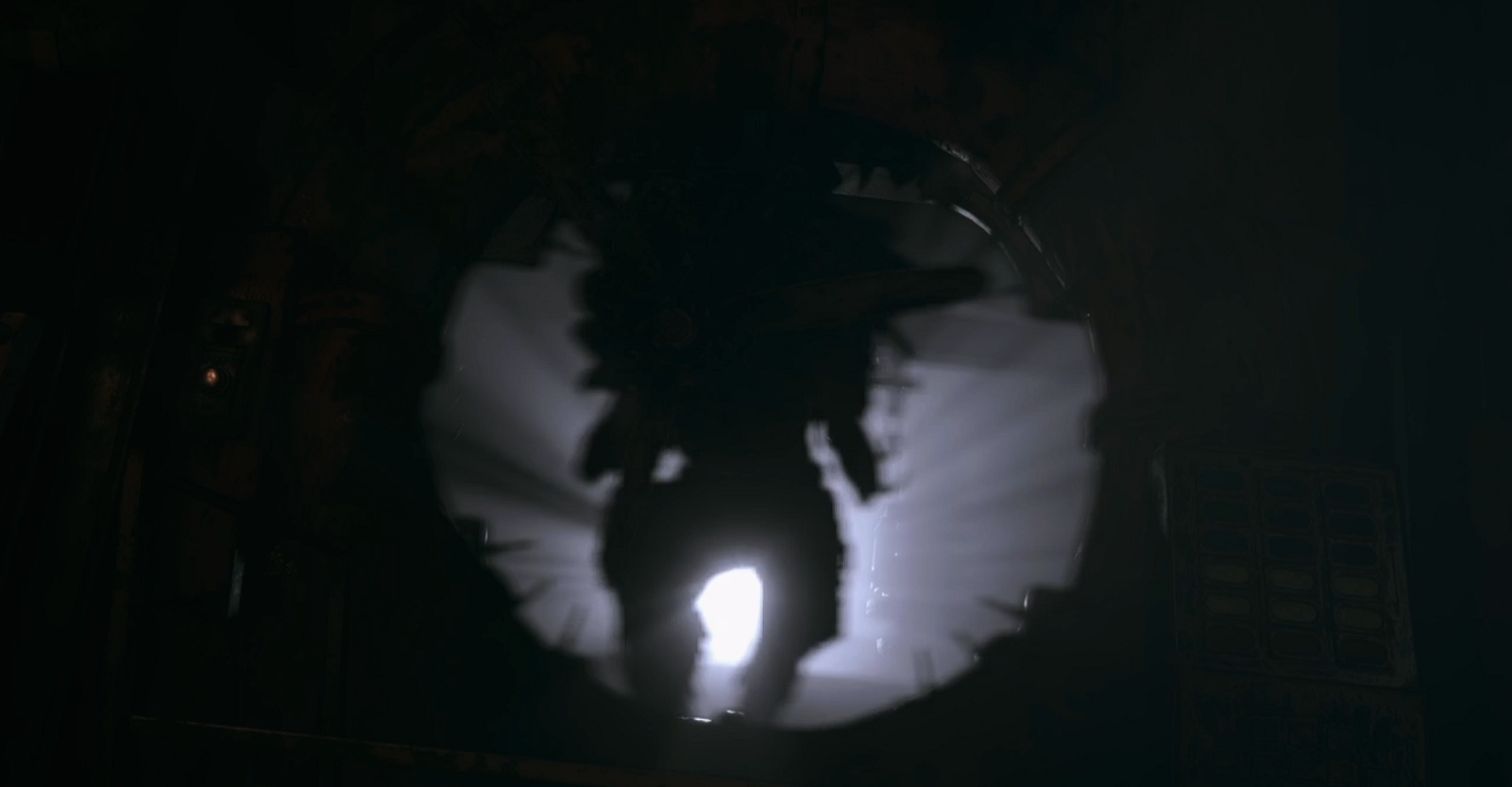 The fan boss emerges from the darkness in Resident Evil Village