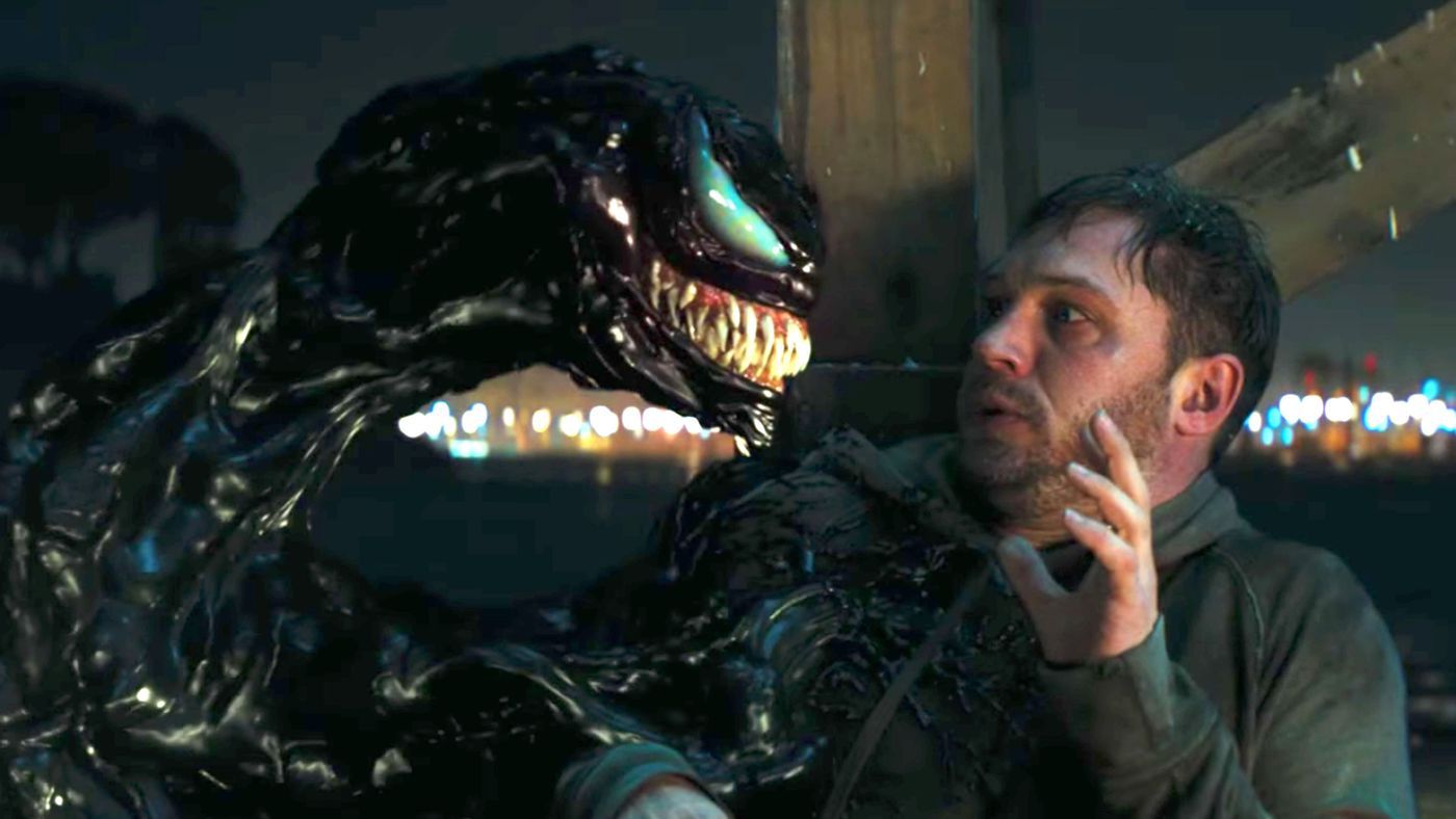 Eddie Brock is startled by Venom jumping out of his body to form a head 