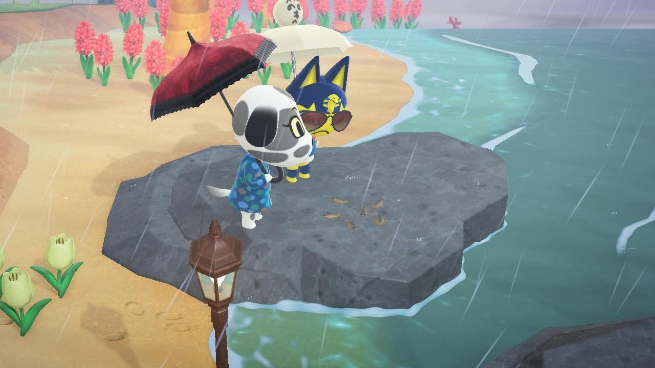 Villagers inspecting a wharf roach in Animal Crossing New Horizons