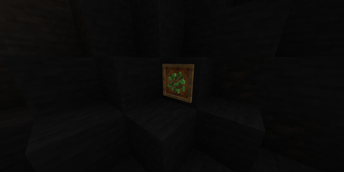 Minecraft Glow Item Frame in darkness with a sapling