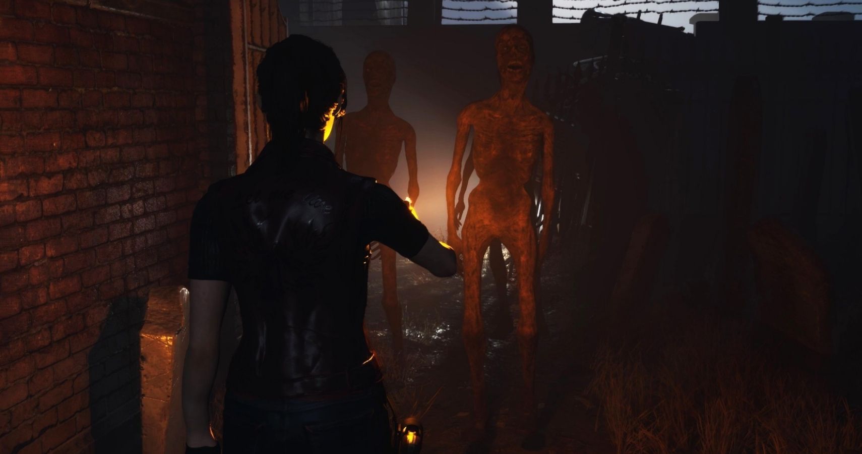 A woman stands in a dark alleyway, holding a torch. Zombies can be faintly spotted.