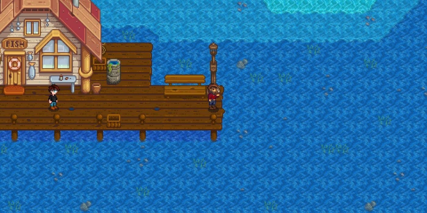 Stardew Valley Ocean - Willy standing on the ocean dock, with player character approaching from behind.