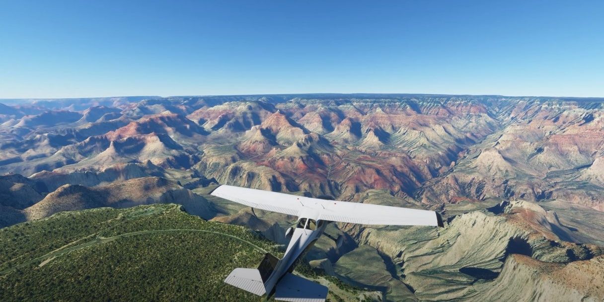 A single engine plane flying over the Grand Canyon