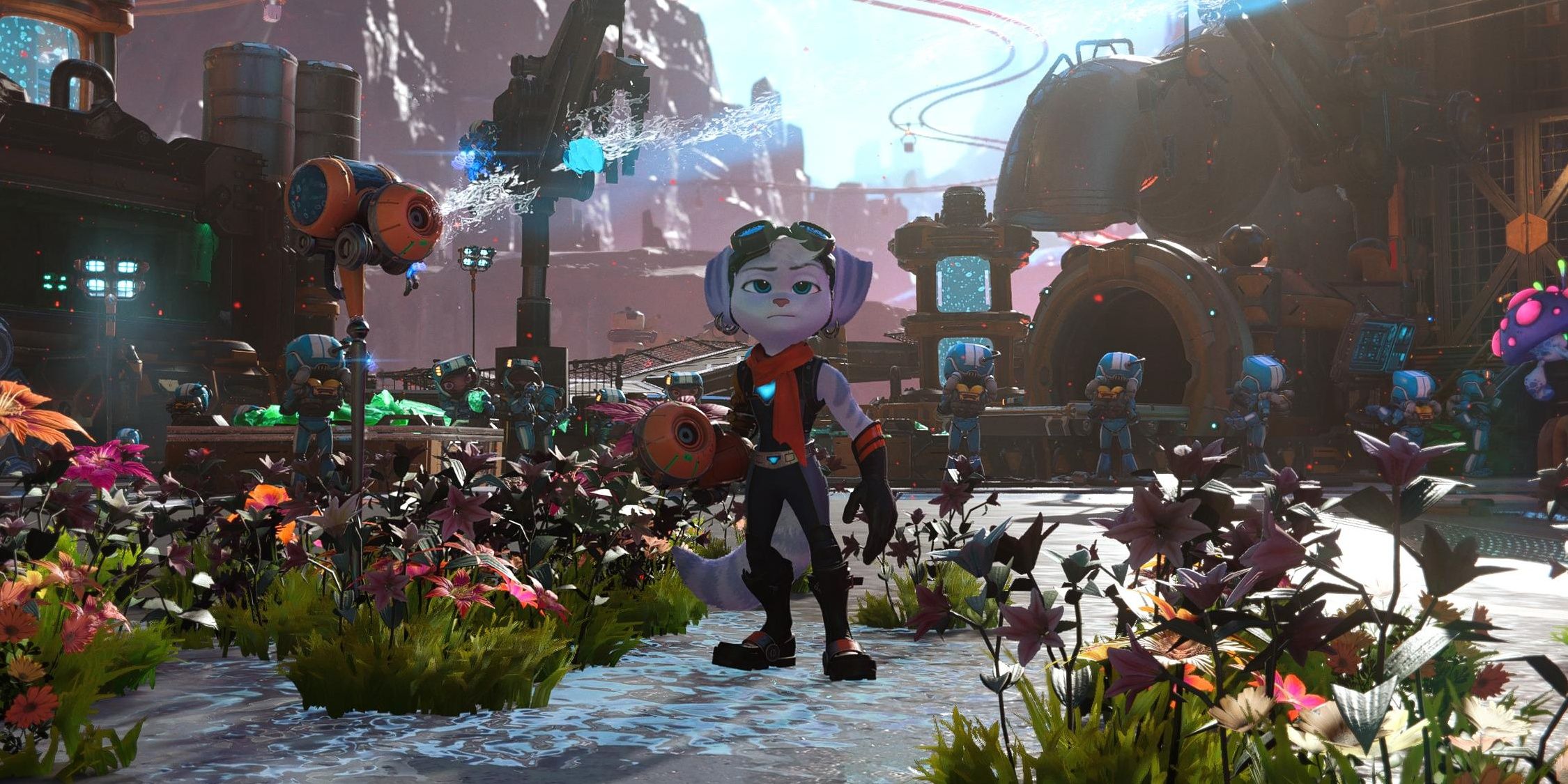 An unamused Rivet standing below the Topiary Sprinkler as it spray water and turns the ground into shrubs and flowers in Ratchet and Clank: Rift Apart