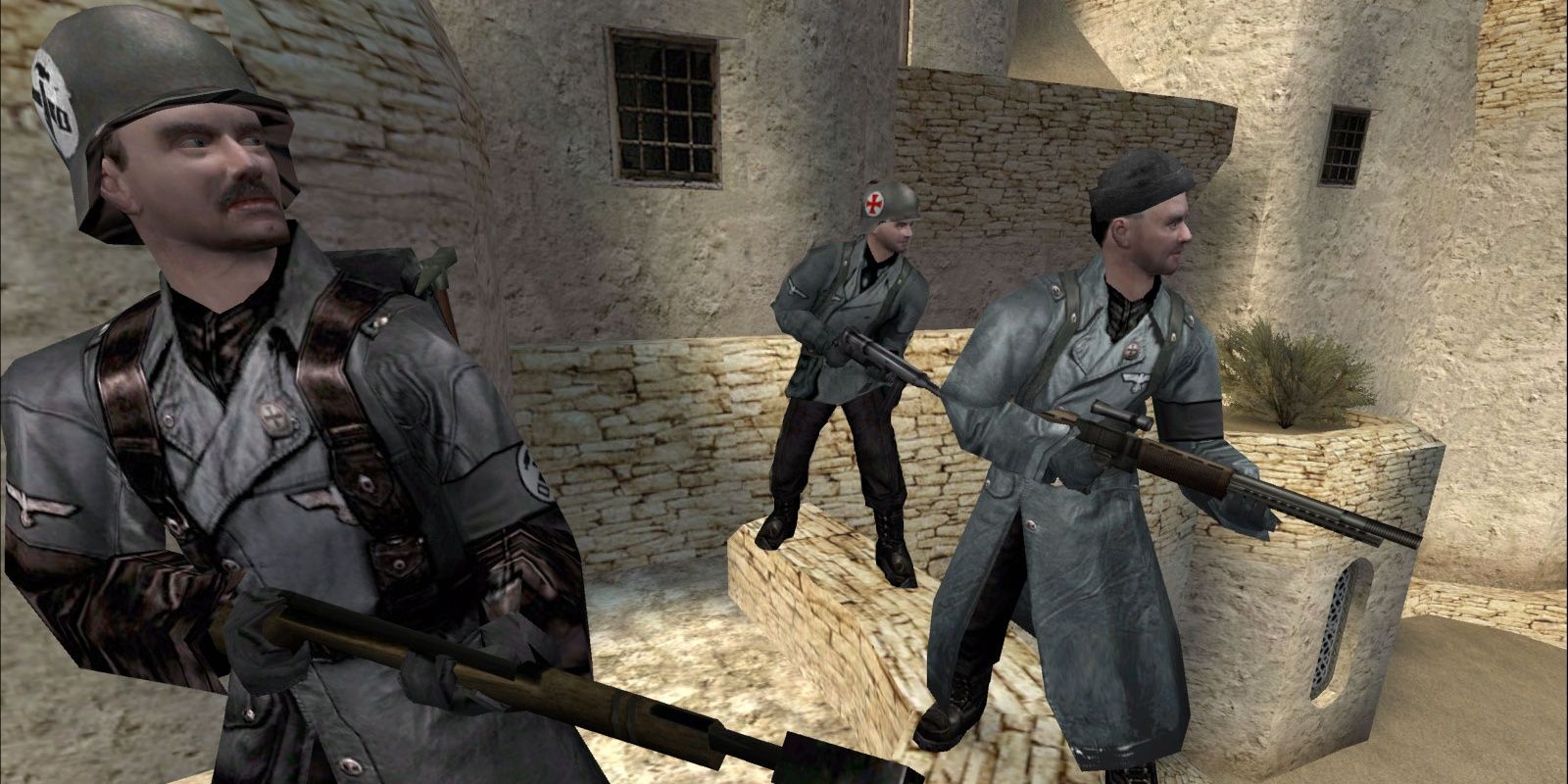 Three soldiers looking to the right while grabbing a rifle.