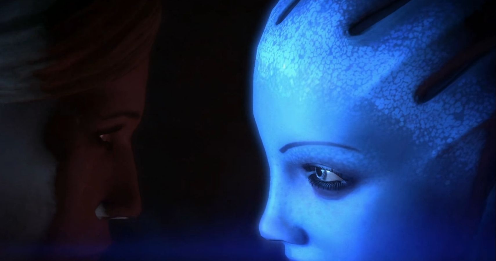 A close shot of Commander Shepard and Liara, a blue alien, face-to-face