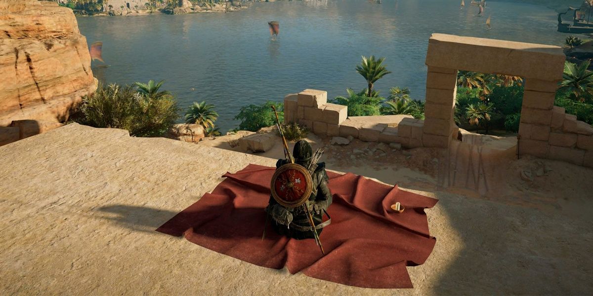 AC Origins a player sitting on the waterfront