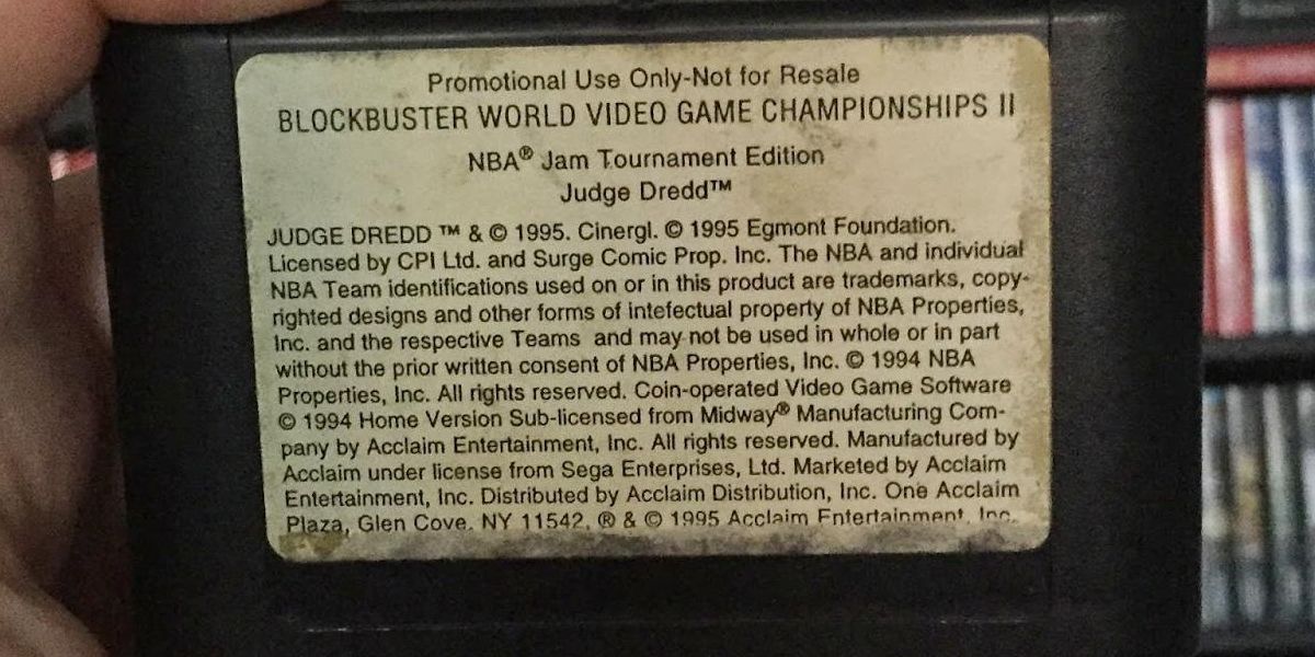 An aged physical cartridge of the Blockbuster Video Game Championships II