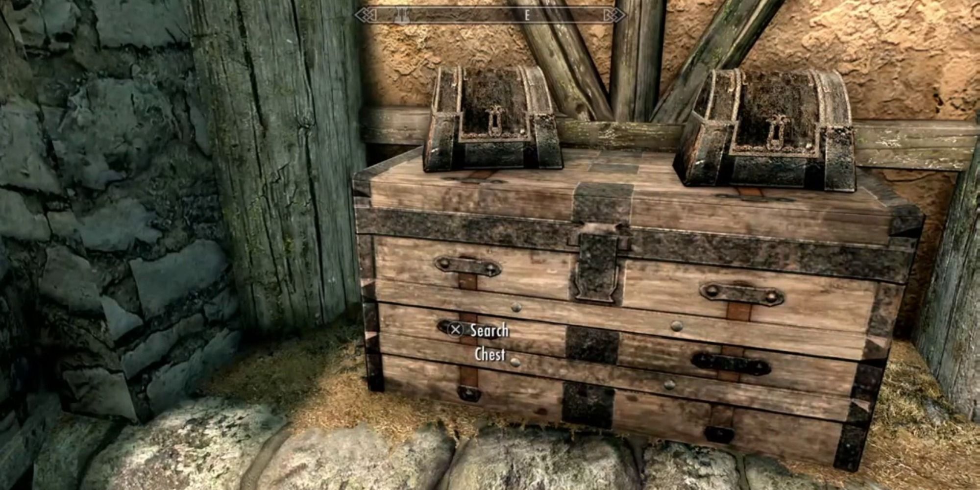A drawer with two chests sitting on top of it