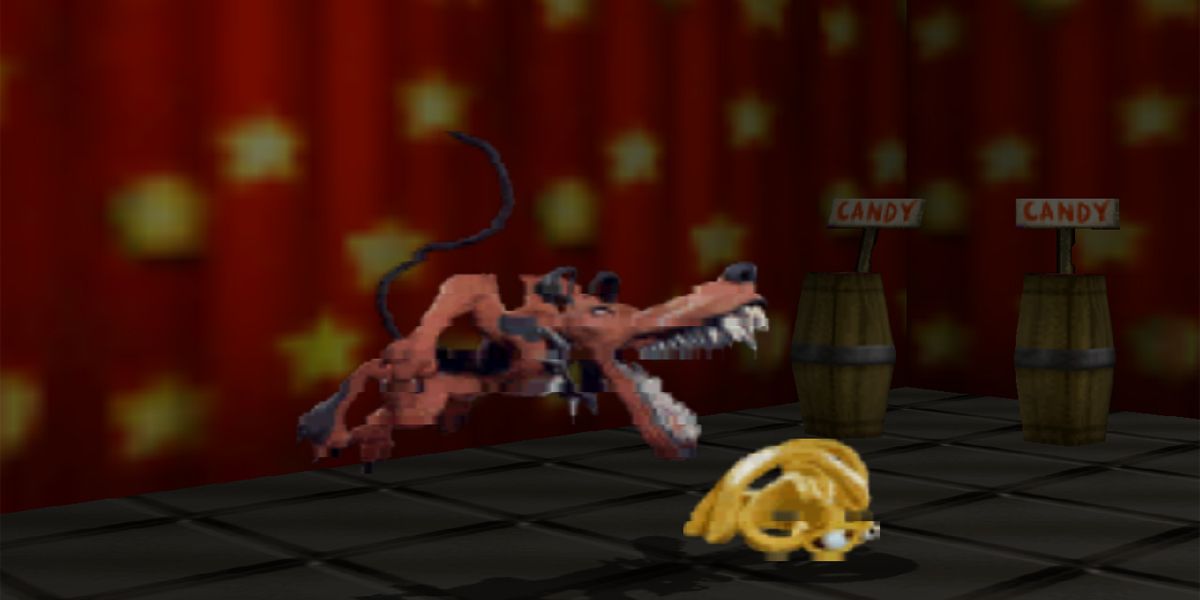 A dog character lunges at a taffy character in Clayfighter Sculptors Cut