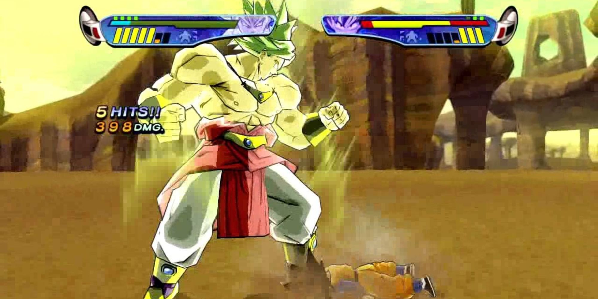 Broly stands over Goten who has been knocked to the ground.