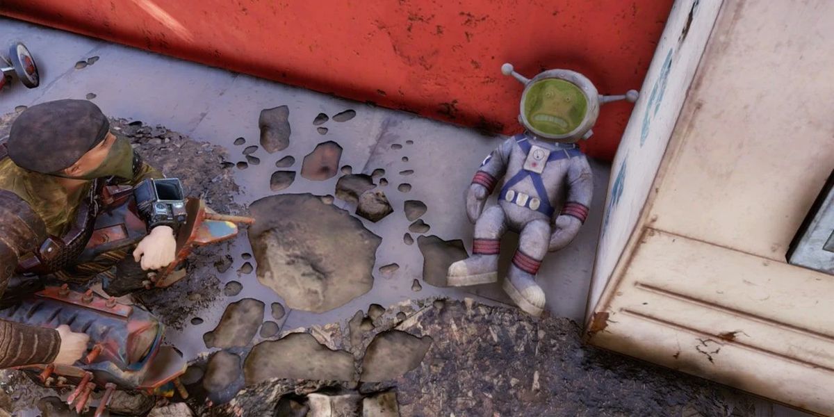 Fallout 76 Monkey Business a player crouched near a monkey toy