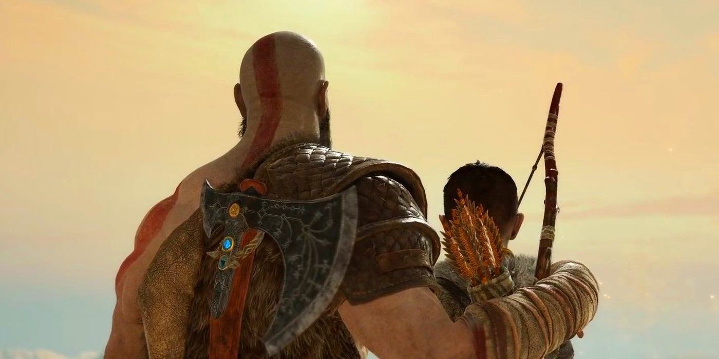God of War Atreus and Kratos standing with back to camera