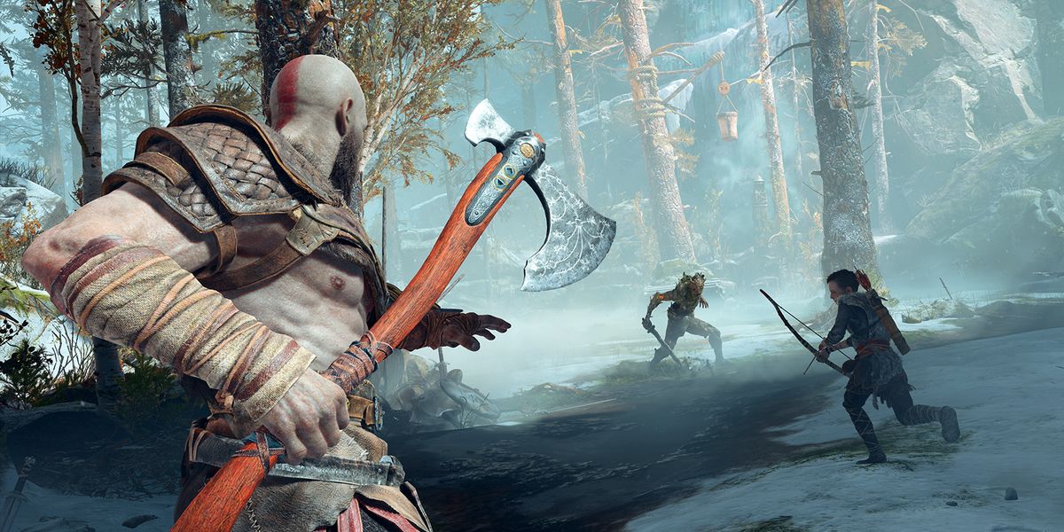 God of War Ps4 Kratos battles an enemy axe in hand