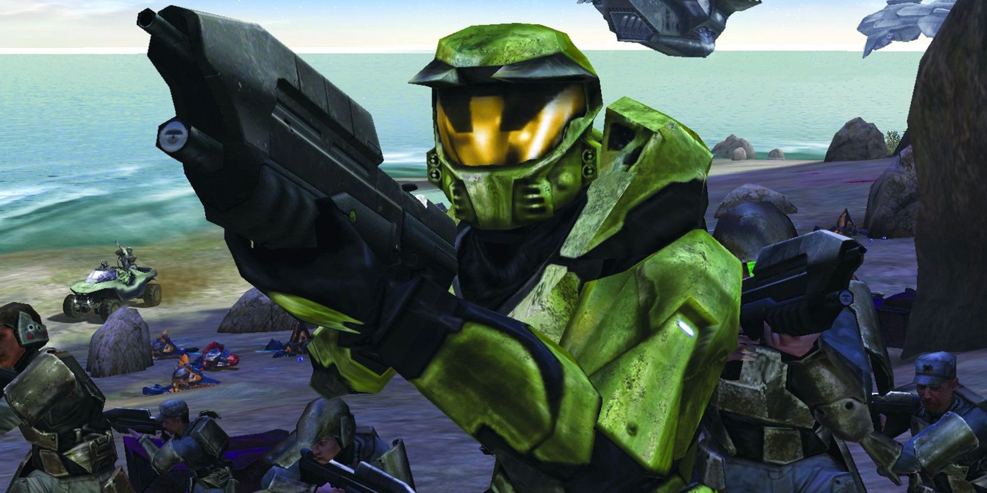 Master Chief brandishing gun on beach in Halo Combat Evolved