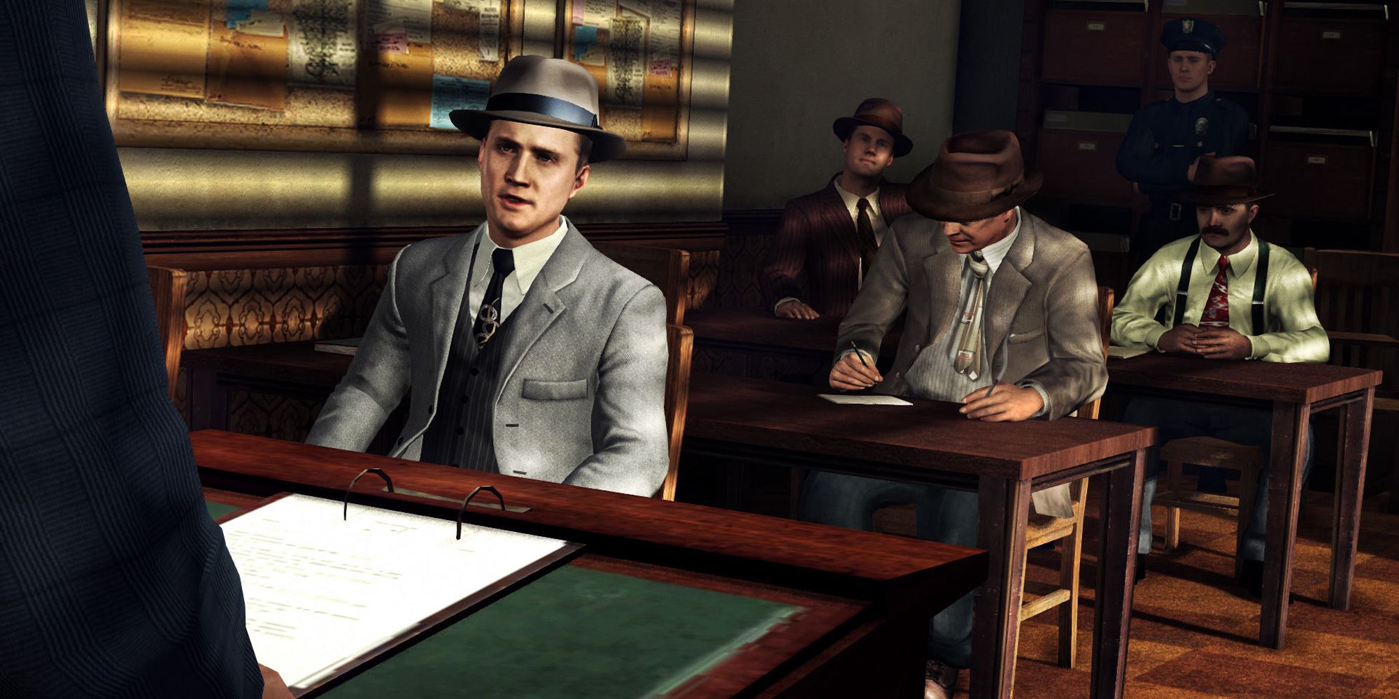 Cole Phelps and a police officer in Rockstar's L.A Noire