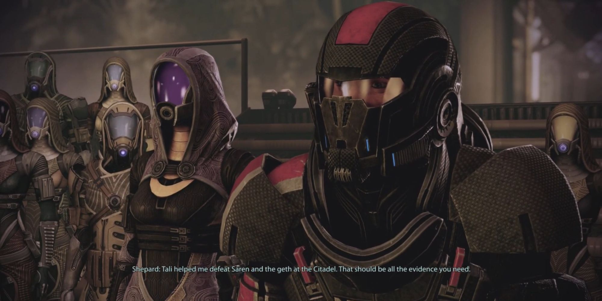 Mass Effect 2 Screenshot Of Shepard Defending Tali