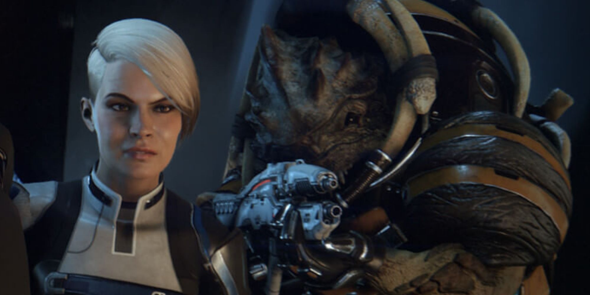 Mass Effect Andromeda - Cora standing next to Drack with his gun out