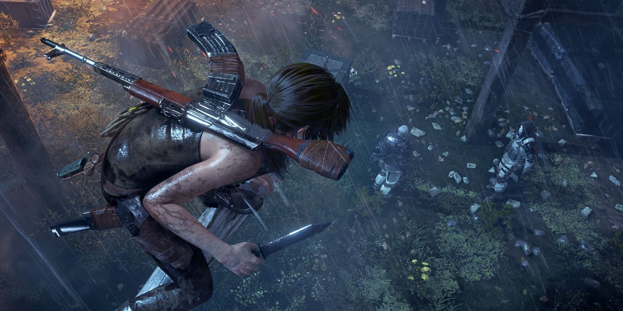 Rise Of The Tomb Raider - Screenshot of Lara Croft as she's about to attack enemies from the air.