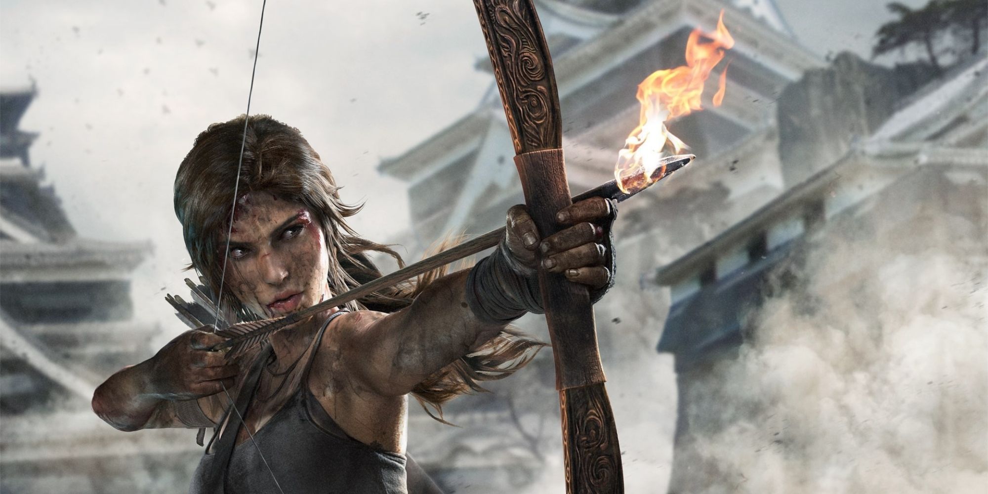 Lara Croft aiming a bow with a flaming arrow In Tomb Raider (2013)