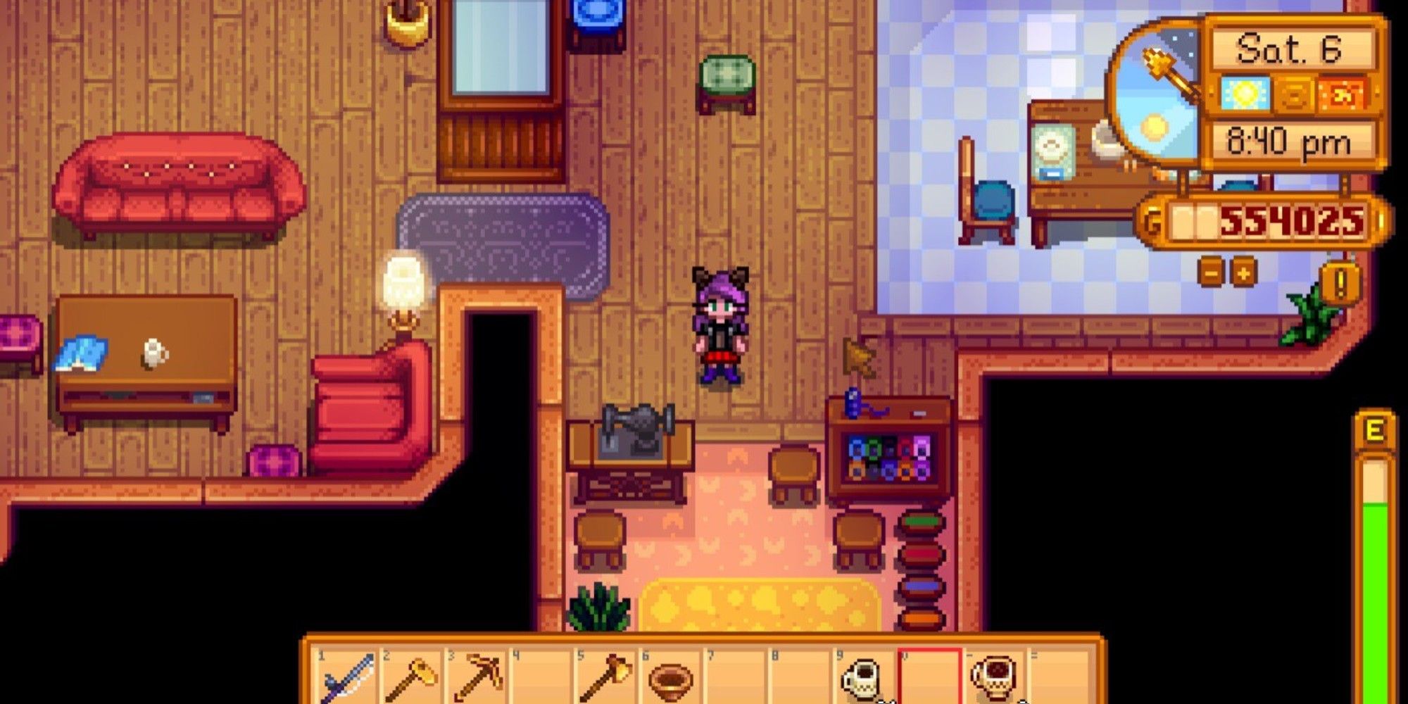 player standing next to emilys sewing machine in her house