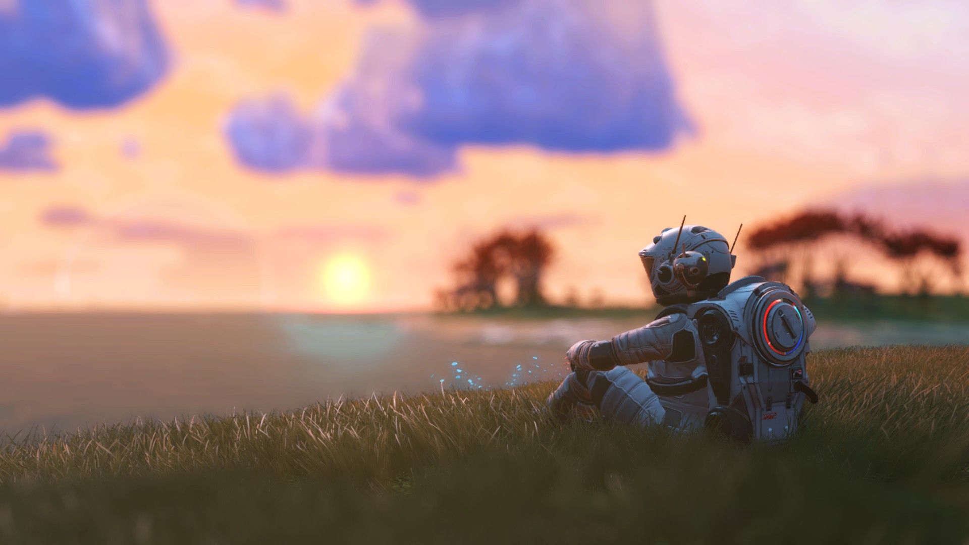 No Man's Sky Explorer Sitting In Field Staring At Sunset