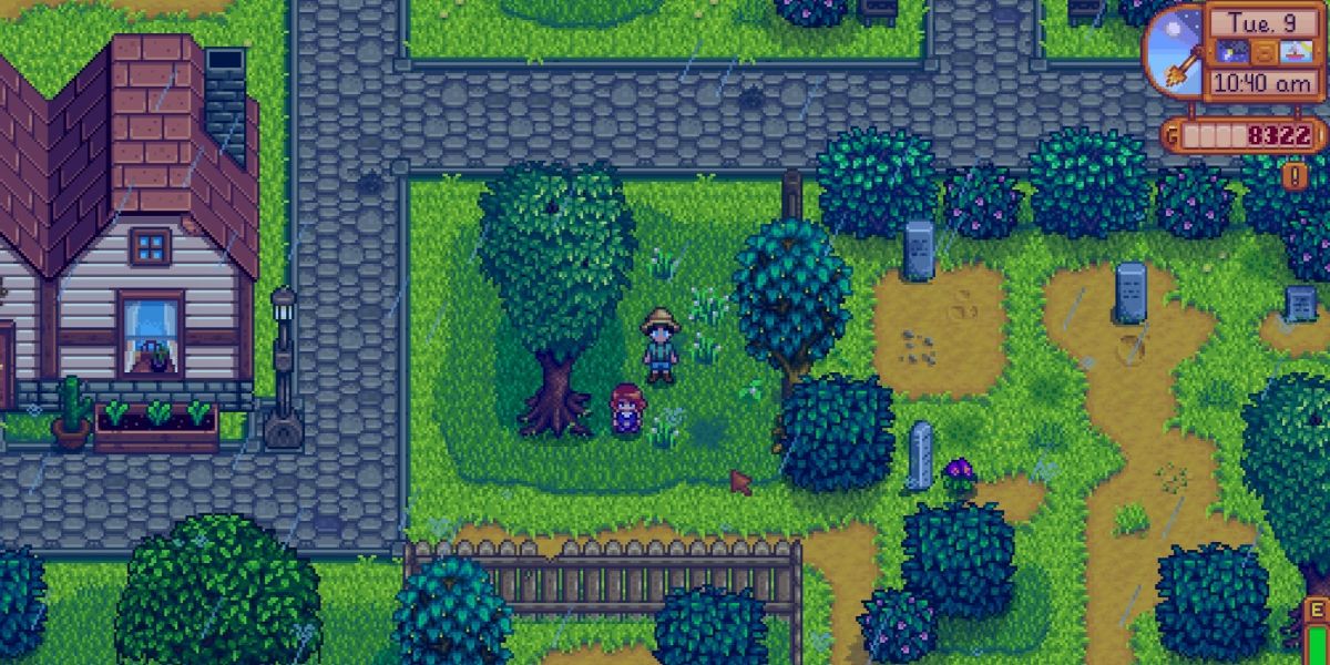 penny sitting under a tree near pelican town graveyard while it rains