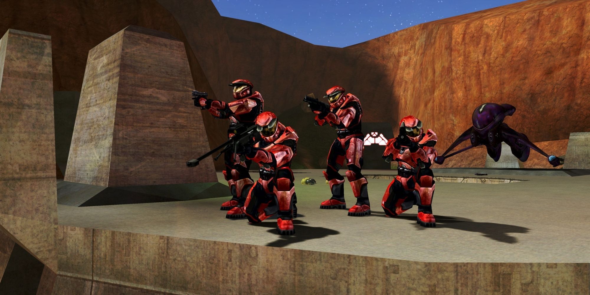 Halo Combat Evolved, 4 Players In Red Armour Standing Together With Their Guns Aimed