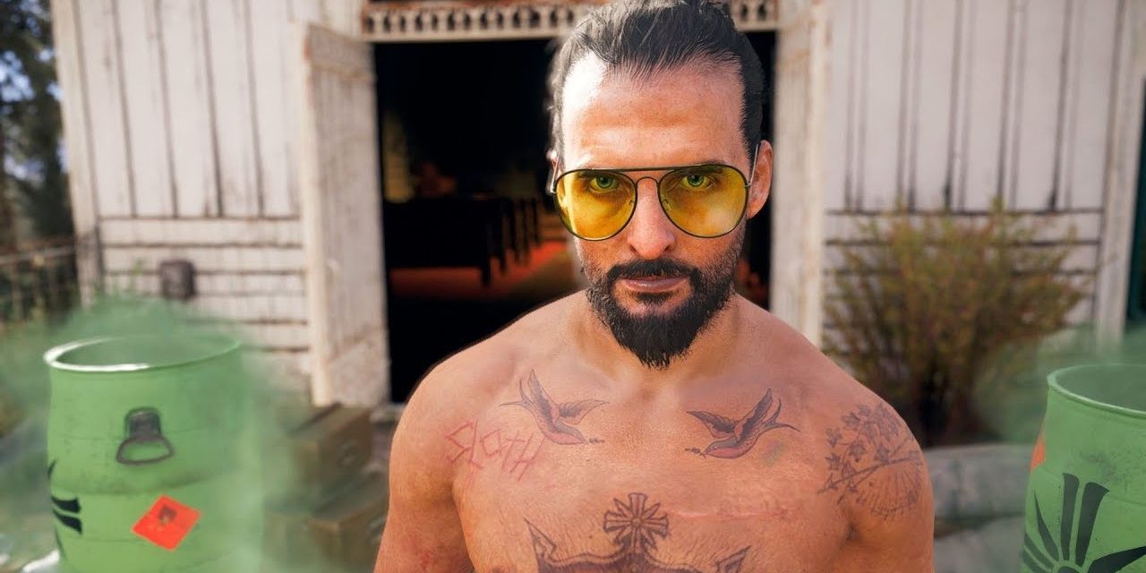 Joseph Seed in Far Cry 5 looking at player with dangerous barrels behind him